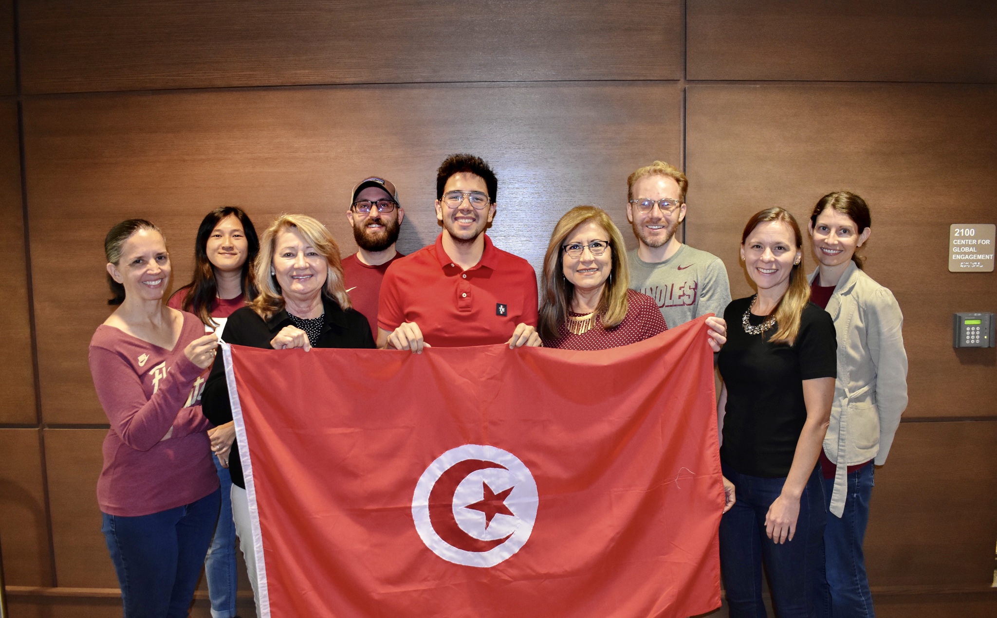 Bechir holding the flag of Tunisia