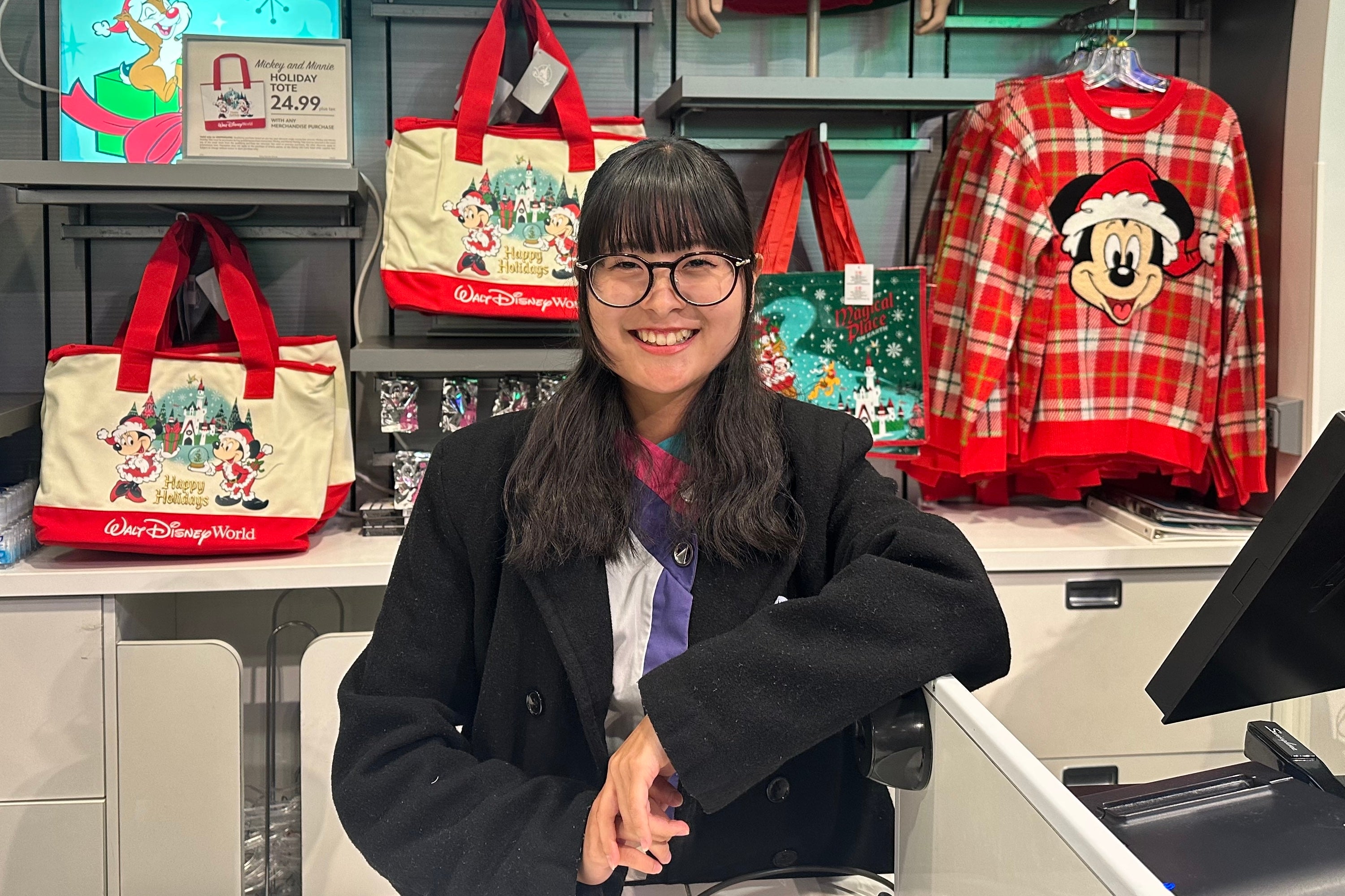 Smiling student working at Disney