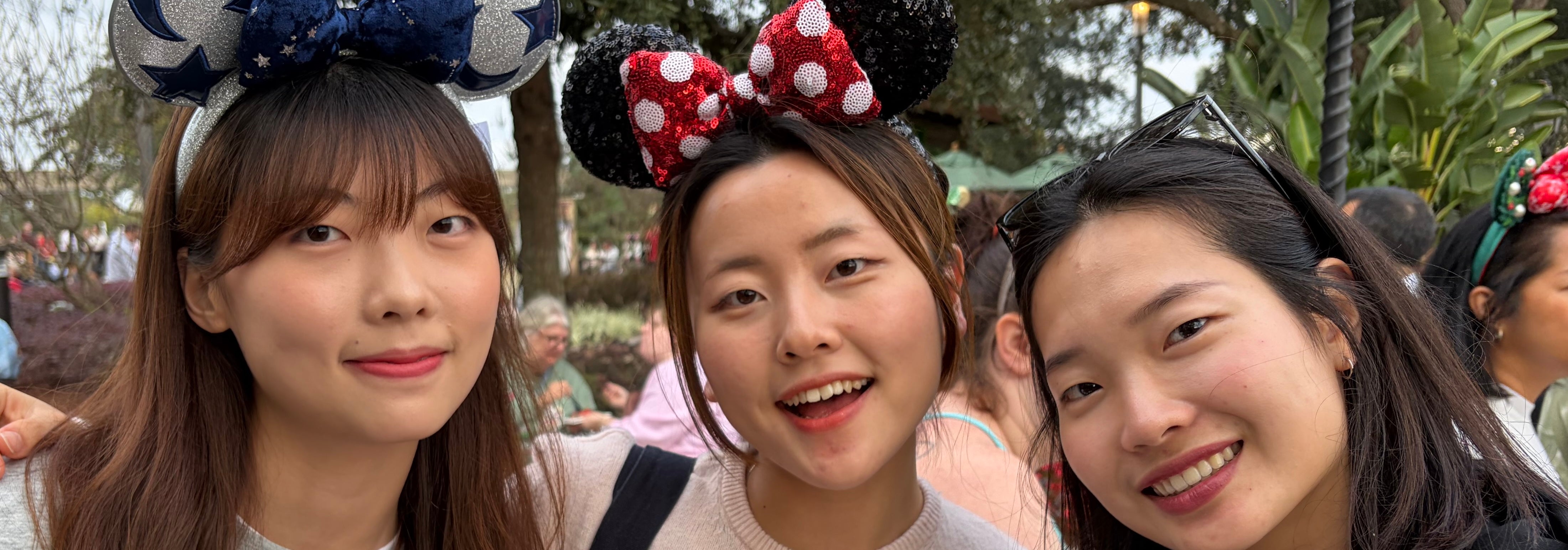 Three Students at EPCOT as Park Guests