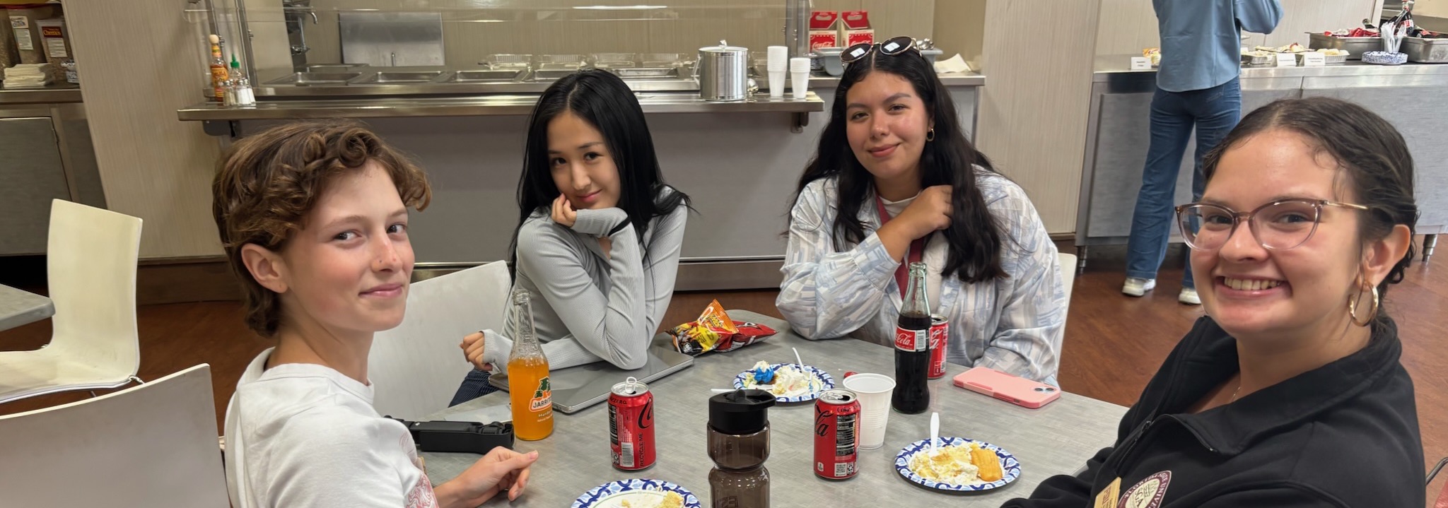 2025 Peer Mentors and Students at a Table